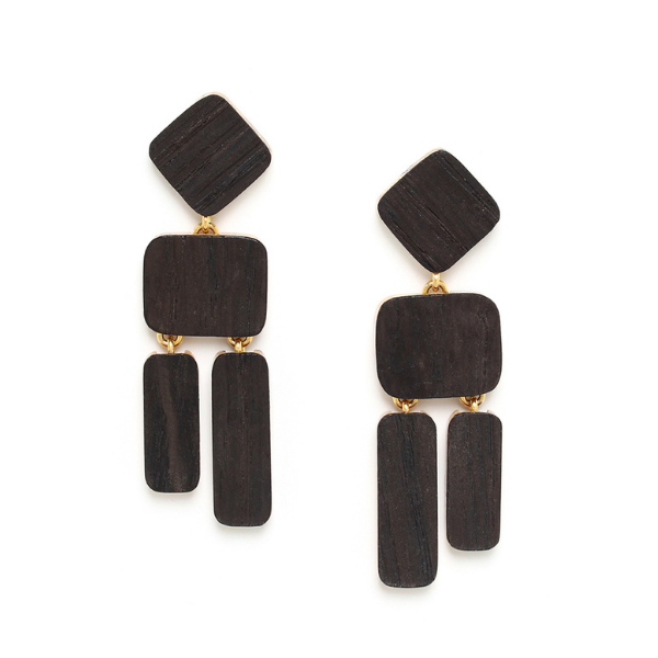 Image of dangle earrings with geometric pieces of lightweight wood.