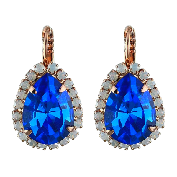 Image of electric blue crystal teardrop shaped earrings trimmed with white seed opalites on a French hook. Rose gold plated metal.