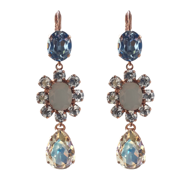 Image of pretty dangle earrings set with pale blue, milky white and clear crystals in a floral centrepiece pattern. Measuring 7cm, French hook, 18ct rose gold gilded metal.