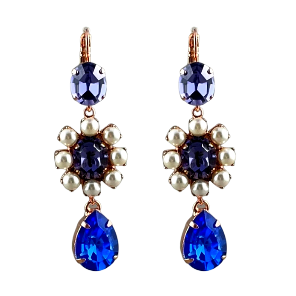 Image of elegant drop earrings embellished with cobalt and purple crystals and faux pearls. French hook clasp.