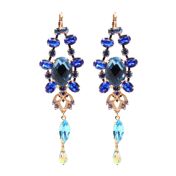 Image of large, formal dangle earrings embellished with pale, electric and navy blue crystals with mauve and aqua crystals.