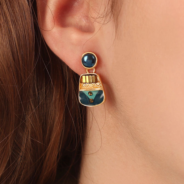 Image of small hand painted blue and gold metal earrings.