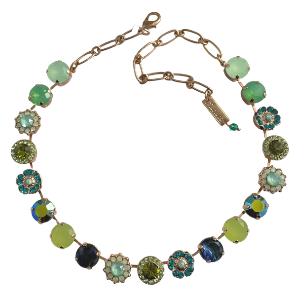 Mariana's Cruising the Caribbean Necklaces are layered in 18-carat Rose Gold featuring Austrian & Czech Crystals:  Chrysolite (238), Peridot Green (214), Erinite Green (360), Pacific Opal (390), Mint Green (397), Royal Green (252), Green Tourmaline (373) that have been co-ordinated with Semi-precious stones:  Green Opalite (M8).